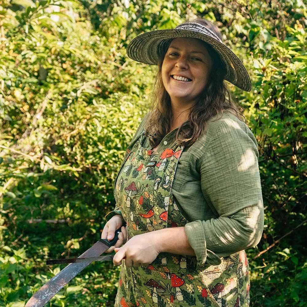 Harriet Daisy Trower smiling in a garden